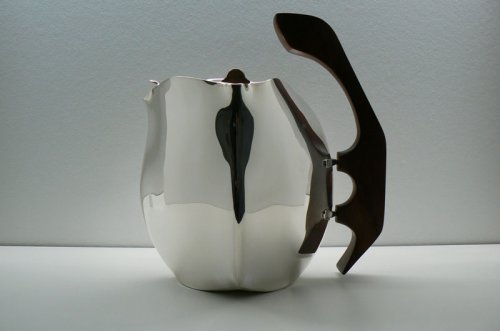 Piece -- materials: silver, palisander wood; dimensions: 18 x 23 x 25h;