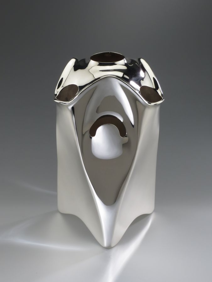 Piece -- materials: silver; dimensions: 13 x 12 x 21 h cm;