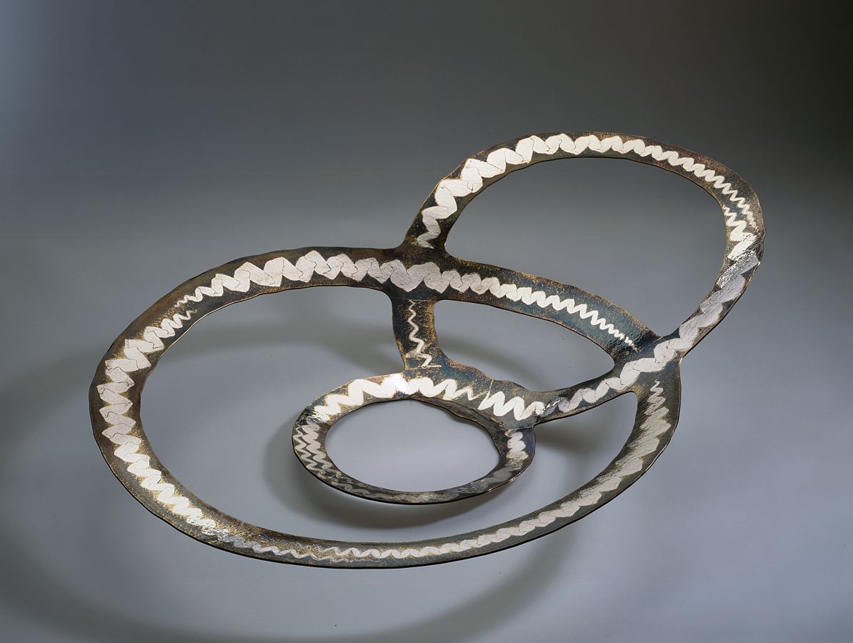 Piece -- materials: silver, brass; dimensions: 61 x 44 x 12 h cm;