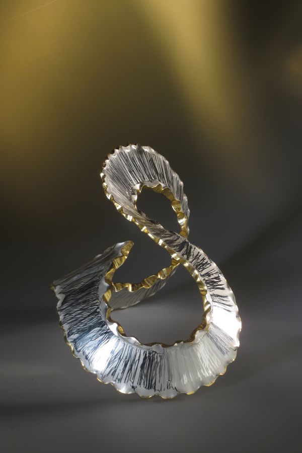 Piece -- materials: silver, gold leaf; dimensions: 17 x 12 x 12 h cm;