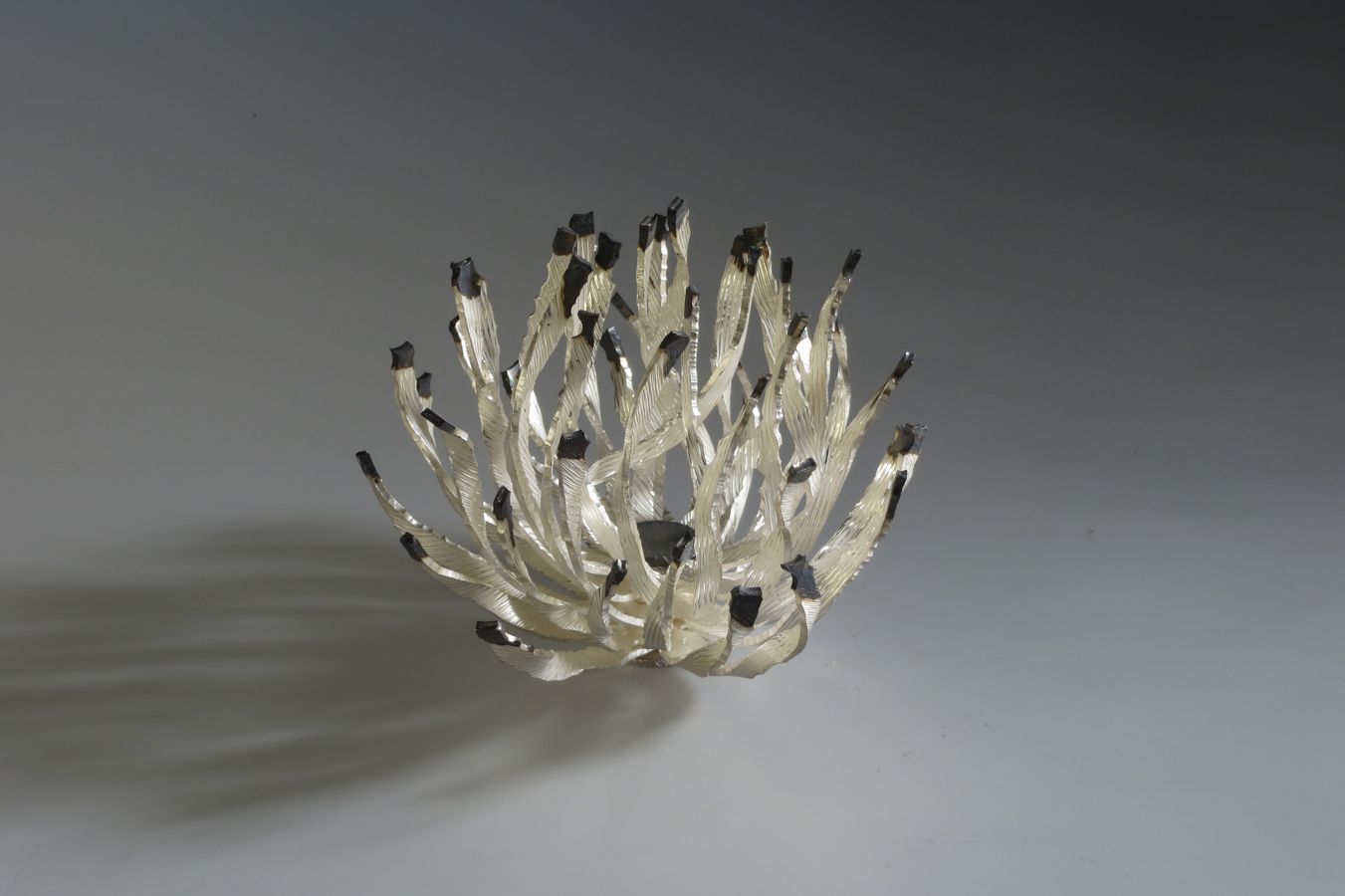 Piece -- materials: silver, partly patinated; dimensions: diameter 11.5 x 9 h cm;