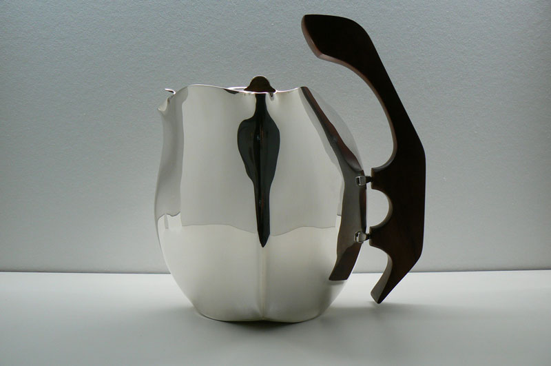 Piece -- materials: silver, palisander wood; dimensions: 18 x 23 x 25h;