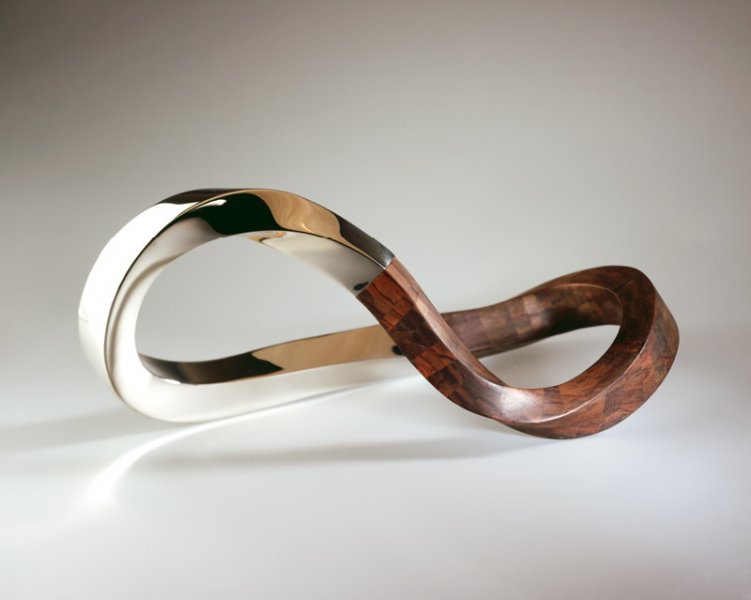 Piece -- materials: silver, palissander; dimensions: 37 x 18 x 14 cm;