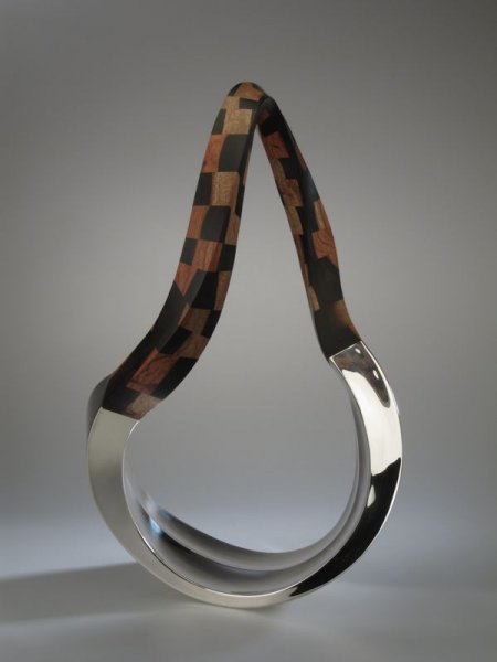 Piece -- materials: silver, bubinga, ebony; dimensions: 34 x 12 x 51 h cm;