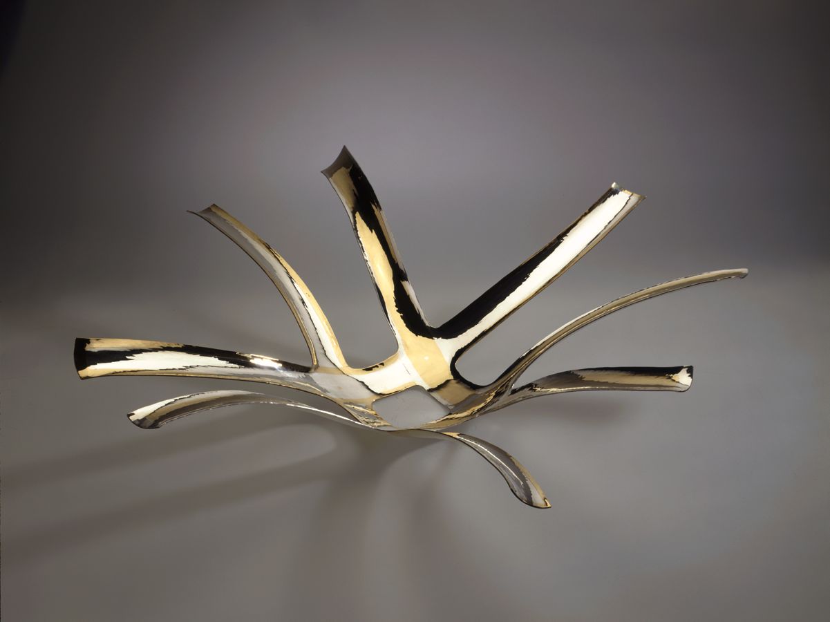 Piece -- materials: silver, brass; dimensions: 45 x 45 x 15 h cm;