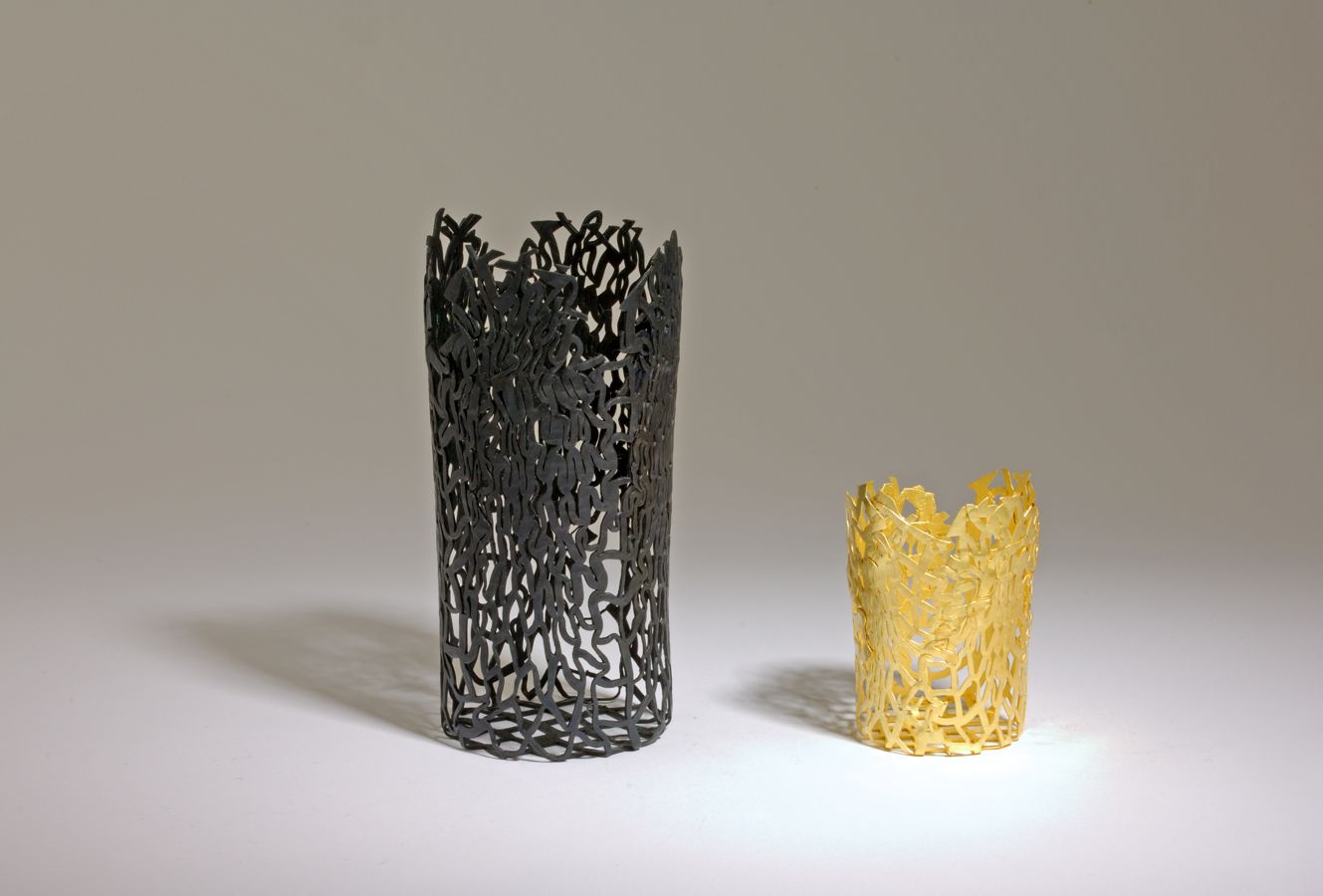 Piece -- materials: copper oxidized, 18 ct gold; dimensions: diameter 6, 13.5 h cm and diameter 4.5, 6 h cm;