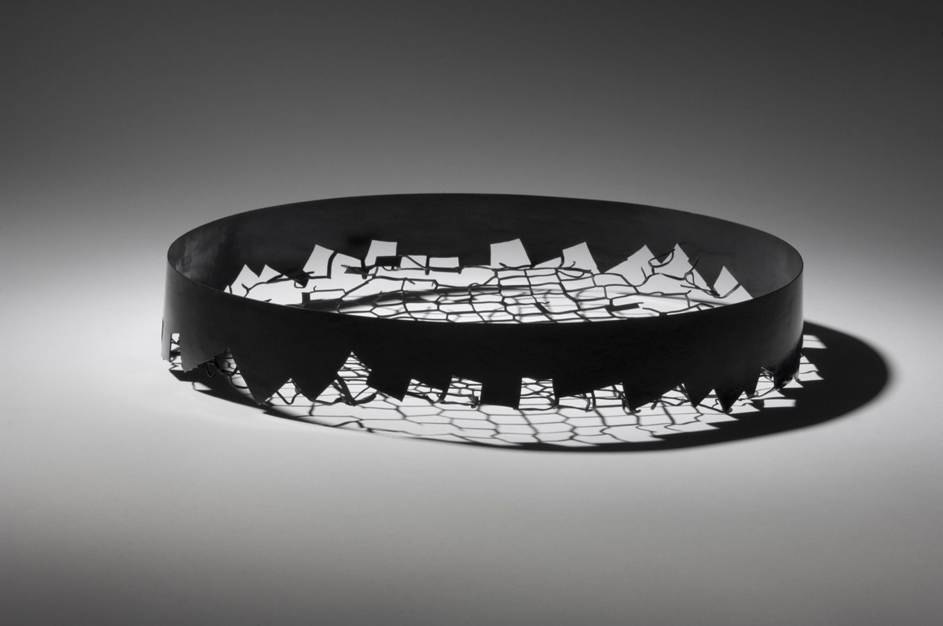 Piece -- materials: silver, patinated silver; dimensions: diameter 24 cm;