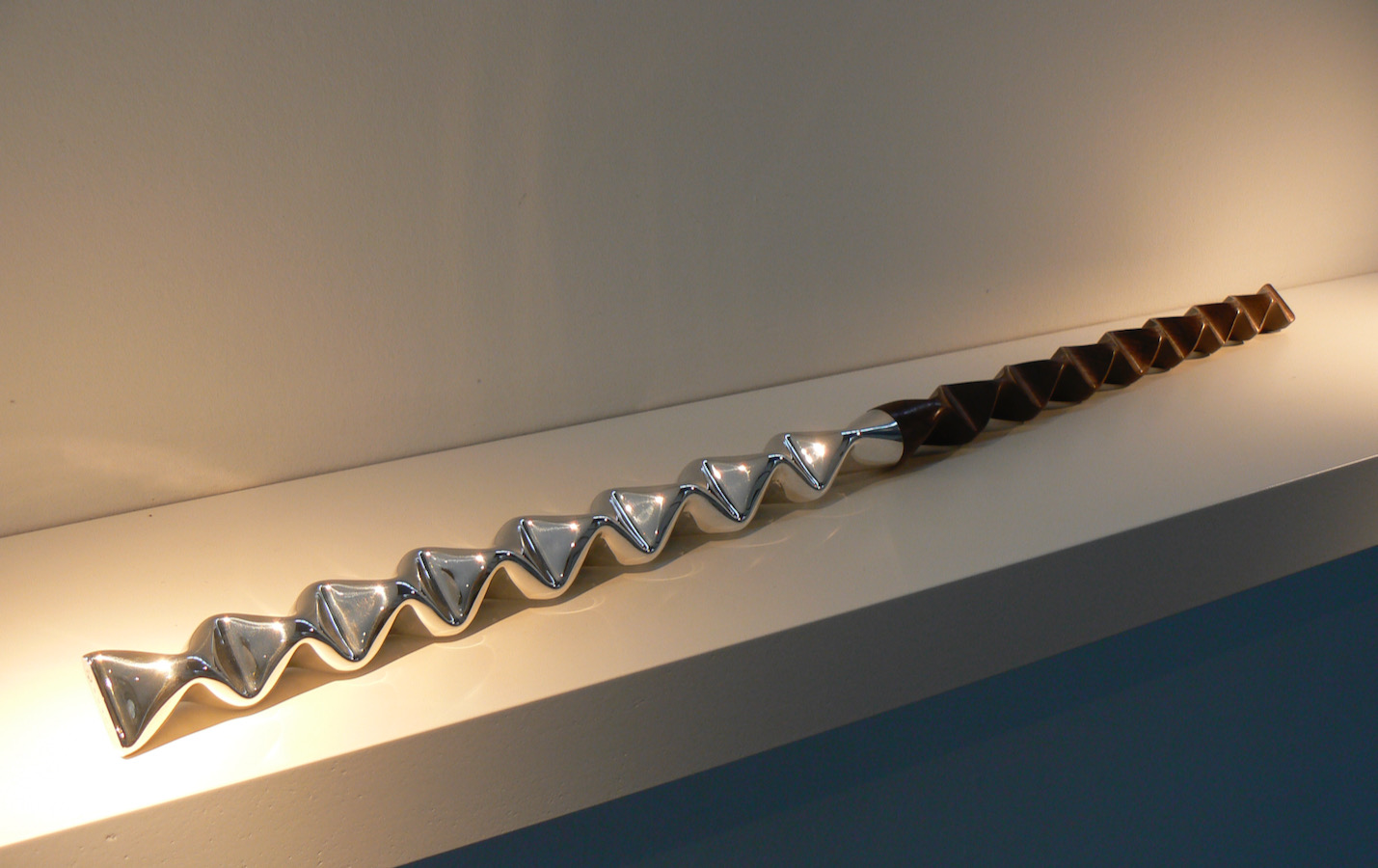 Piece -- materials: silver, palissander; dimensions: l 80 cm;